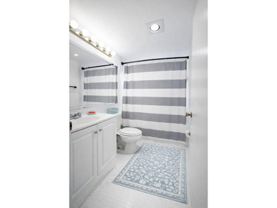 Immaculate 2-bedroom, 1.5-bath condo with a stunning lake view - photo 17