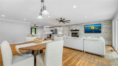 Lakefront living at its finest! This updated 4-bedroom, 3-bath - photo 8