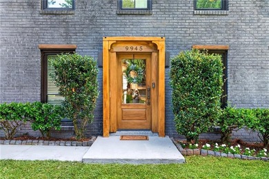 Tucked into a private wooded lot with a stunning lake view in - photo 10