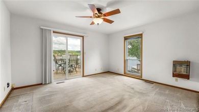 Welcome to lake life in this warm and inviting lakefront home - photo 6