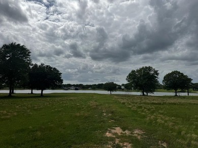 This cleared and remarkable, waterfront 5 acre parcel is ready - photo 1