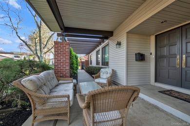 Set within the coveted Estates II gated community in Manhasset - photo 3