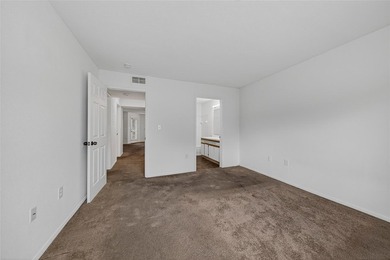 First-floor lakefront unit with screened patio in a gated - photo 12