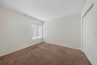 First-floor lakefront unit with screened patio in a gated - photo 18
