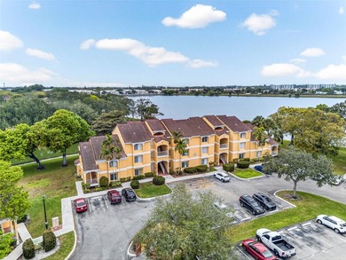 First-floor lakefront unit with screened patio in a gated - photo 20