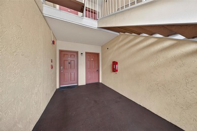 First-floor lakefront unit with screened patio in a gated - photo 21