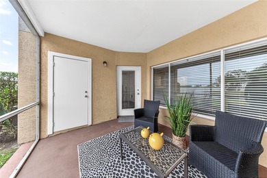 First-floor lakefront unit with screened patio in a gated - photo 22