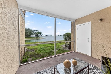First-floor lakefront unit with screened patio in a gated - photo 23