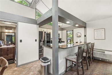 Tucked among the trees in the sought-after Tan-Tar-A Estates - photo 6