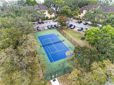 First-floor lakefront unit with screened patio in a gated - photo 28