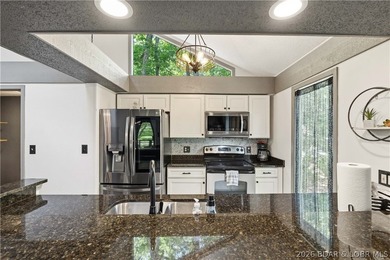 Tucked among the trees in the sought-after Tan-Tar-A Estates - photo 9
