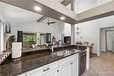 Tucked among the trees in the sought-after Tan-Tar-A Estates - photo 10