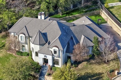 Exceptional French-inspired home with a modern flair, located in - photo 1