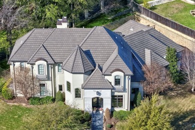 Exceptional French-inspired home with a modern flair, located in - photo 2