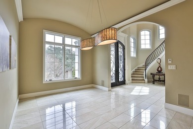Exceptional French-inspired home with a modern flair, located in - photo 4
