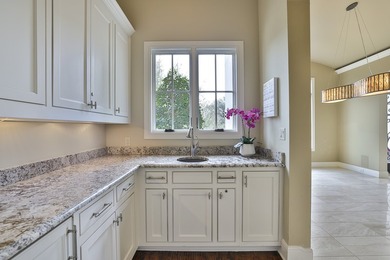 Exceptional French-inspired home with a modern flair, located in - photo 5