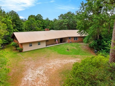 Secluded from the road and situated on 2.91 beautiful acres this - photo 3
