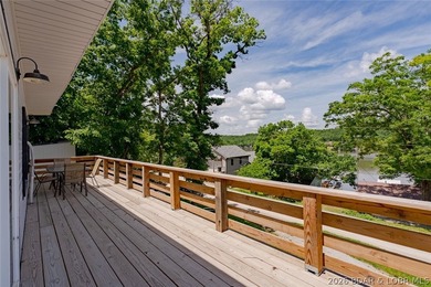Lake views, extra space, and endless possibilities! This newly - photo 1