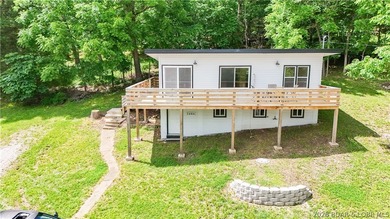 Lake views, extra space, and endless possibilities! This newly - photo 2