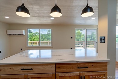Lake views, extra space, and endless possibilities! This newly - photo 6