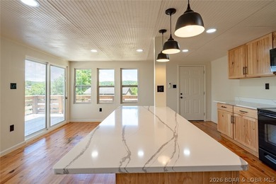 Lake views, extra space, and endless possibilities! This newly - photo 8
