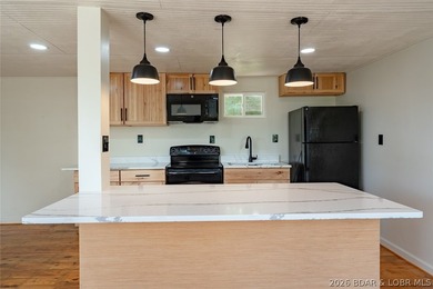 Lake views, extra space, and endless possibilities! This newly - photo 10