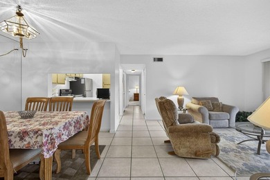 Enjoy peaceful lake views from this condo w/ living/dining room - photo 12