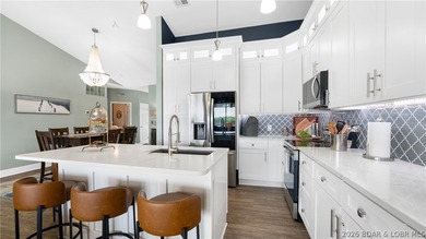 Experience lake living at its finest in this stunning - photo 6