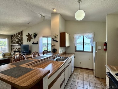 RARE CONDO NOW AVAILABLE!! Jonathan's Landing top floor, end - photo 5