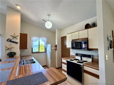 RARE CONDO NOW AVAILABLE!! Jonathan's Landing top floor, end - photo 7