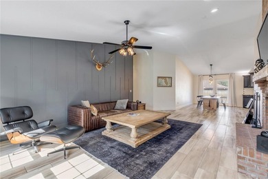 Welcome to a beautifully updated home located within the gated - photo 8