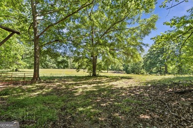 Tucked between Athens and Lake Oconee in the peaceful - photo 58
