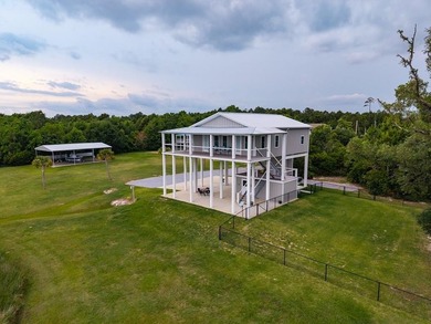 Nearly new 3BR/2.5BA coastal home in Bay St. Louis with stunning - photo 1