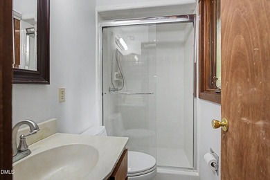 Tucked away on a sprawling corner lot of over 1/2 an acre in the - photo 14