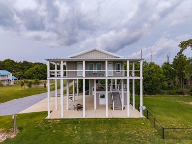 Nearly new 3BR/2.5BA coastal home in Bay St. Louis with stunning - photo 5
