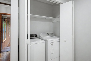 Tucked away on a sprawling corner lot of over 1/2 an acre in the - photo 15