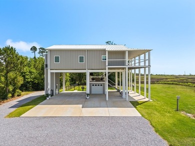 Nearly new 3BR/2.5BA coastal home in Bay St. Louis with stunning - photo 6