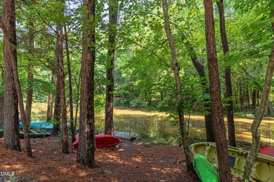 Tucked away on a sprawling corner lot of over 1/2 an acre in the - photo 24