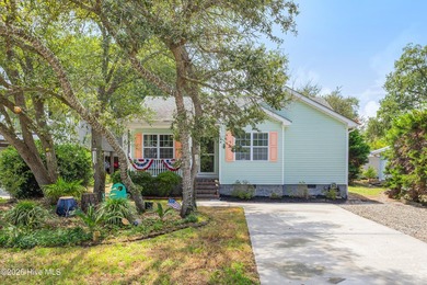 Located on a quiet street in Oak Island, between the - photo 3