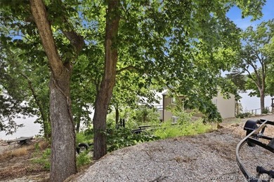 THINK THE VERY GENTLE BUILDABLE LAKE LOTS ALL GONE? NOPE! Own an - photo 8