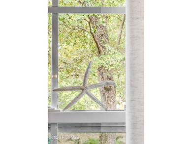 Located on a quiet street in Oak Island, between the - photo 8