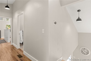 This stunning reverse 2-story lakefront home on MM 3 in Eldon - photo 7