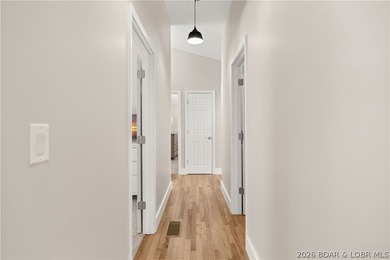 This stunning reverse 2-story lakefront home on MM 3 in Eldon - photo 8