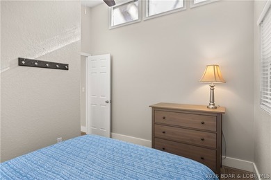 This stunning reverse 2-story lakefront home on MM 3 in Eldon - photo 10