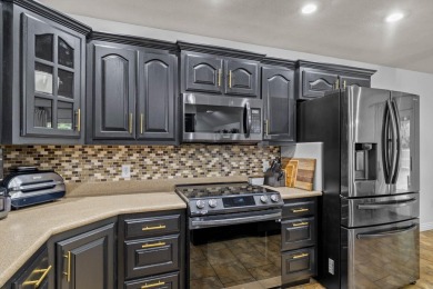 This gorgeous 3 bed, 2 bath, all-brick home with a three-car