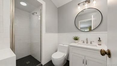 Welcome to this fully renovated gem located in the highly - photo 11