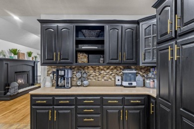 This gorgeous 3 bed, 2 bath, all-brick home with a three-car