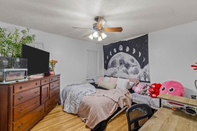 This gorgeous 3 bed, 2 bath, all-brick home with a three-car