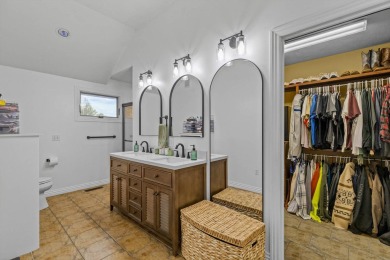 This gorgeous 3 bed, 2 bath, all-brick home with a three-car