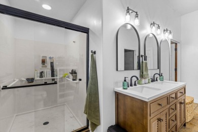 This gorgeous 3 bed, 2 bath, all-brick home with a three-car